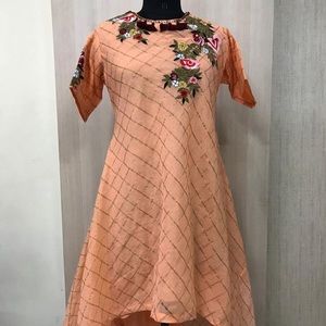 Fancy designer self weave banarsi designer kurti  with thread work and tassels.